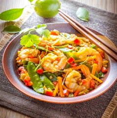 Gamberi saltati con verdure