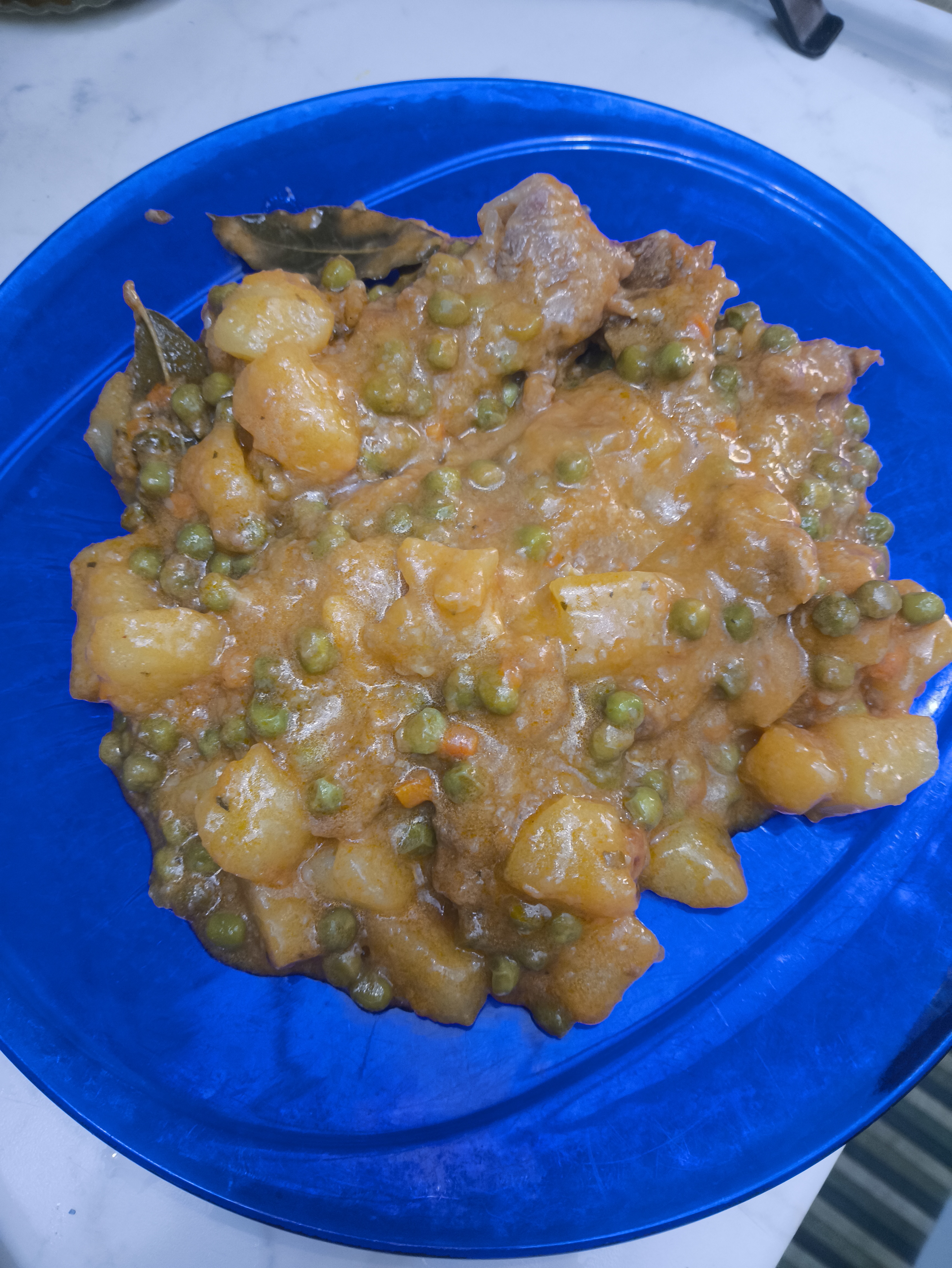 Spezzatino di vitello patate e piselli