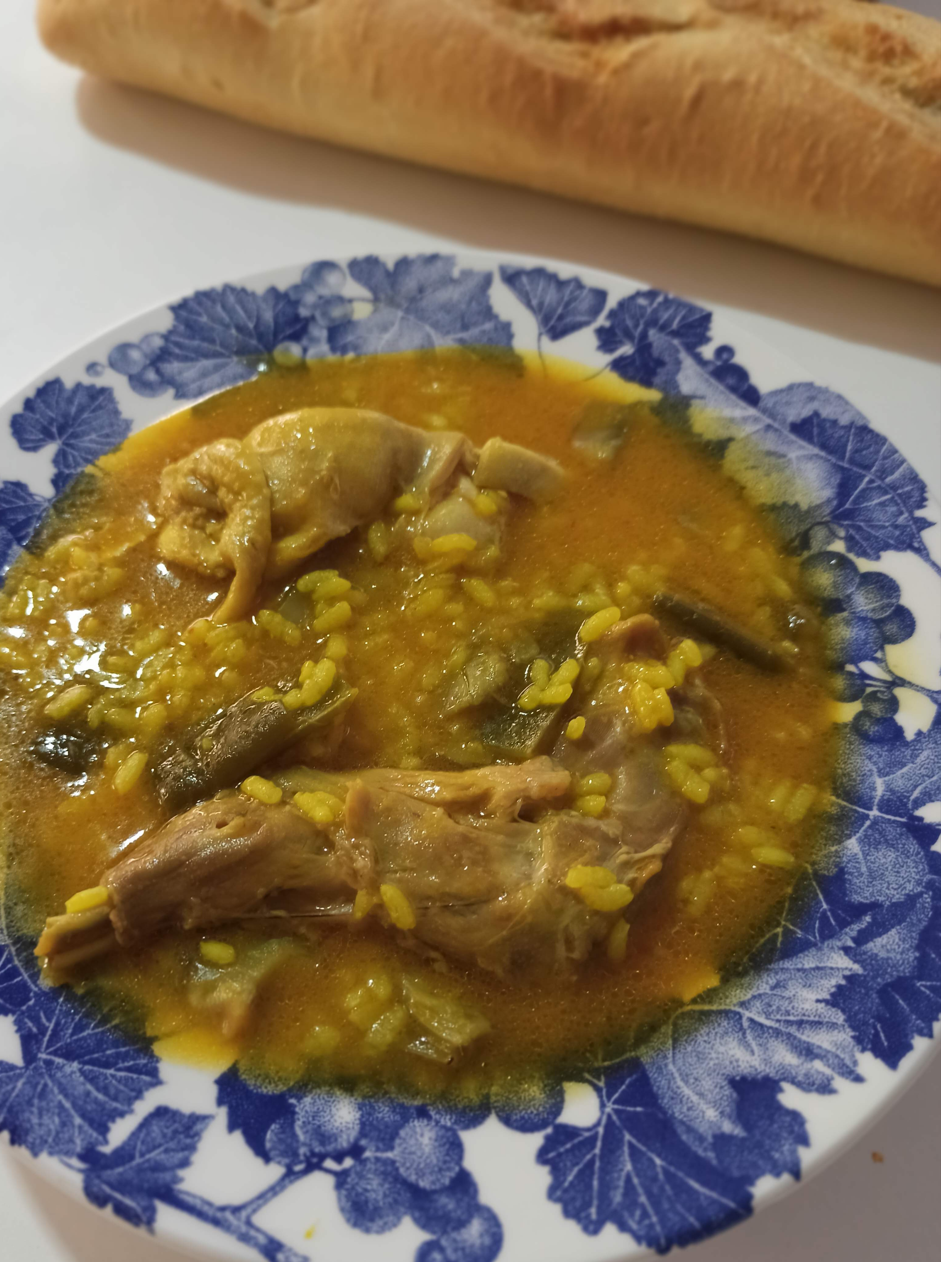 Arroz caldoso de pollo y conejo