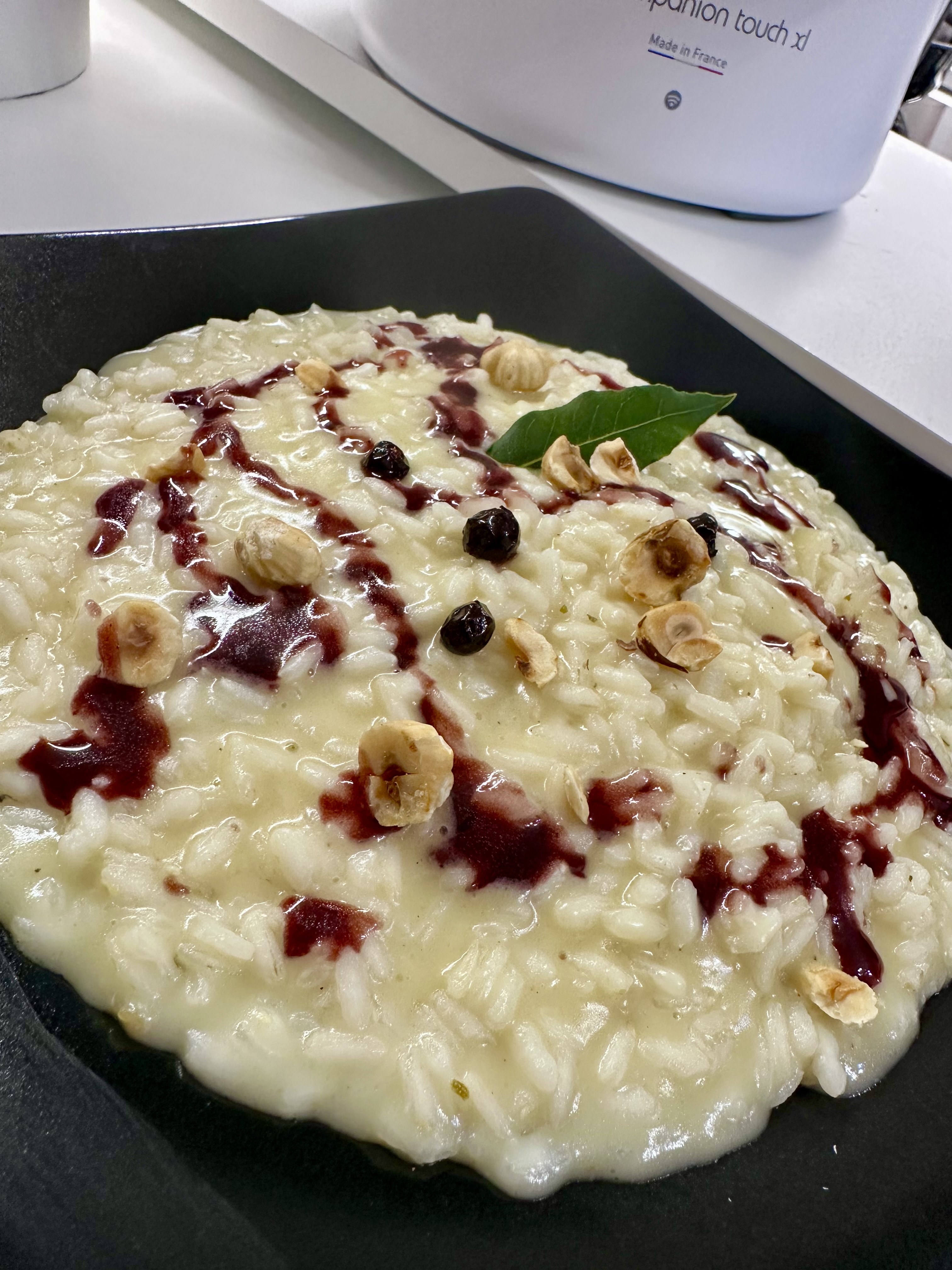 Risotto cacio e pepe con riduzione di vino