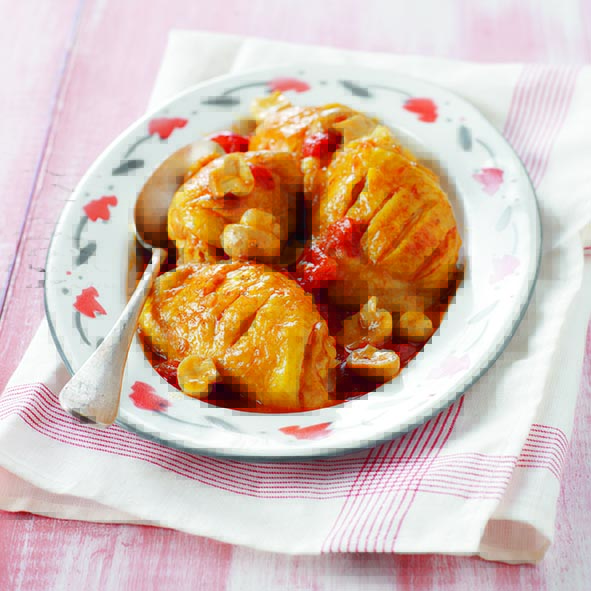 Pollo con tomates y champiñones