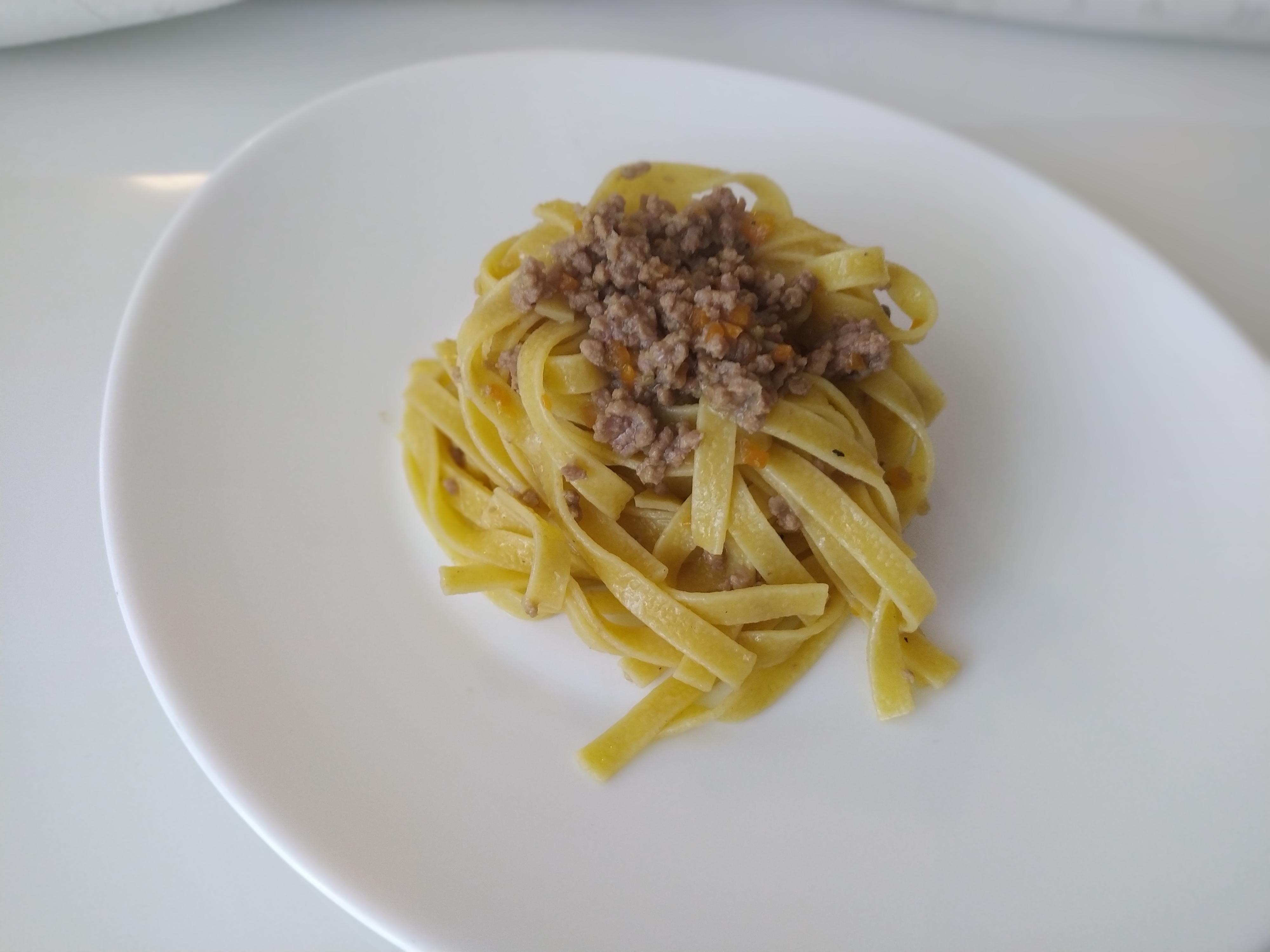 Tagliatelle al ragù affogato