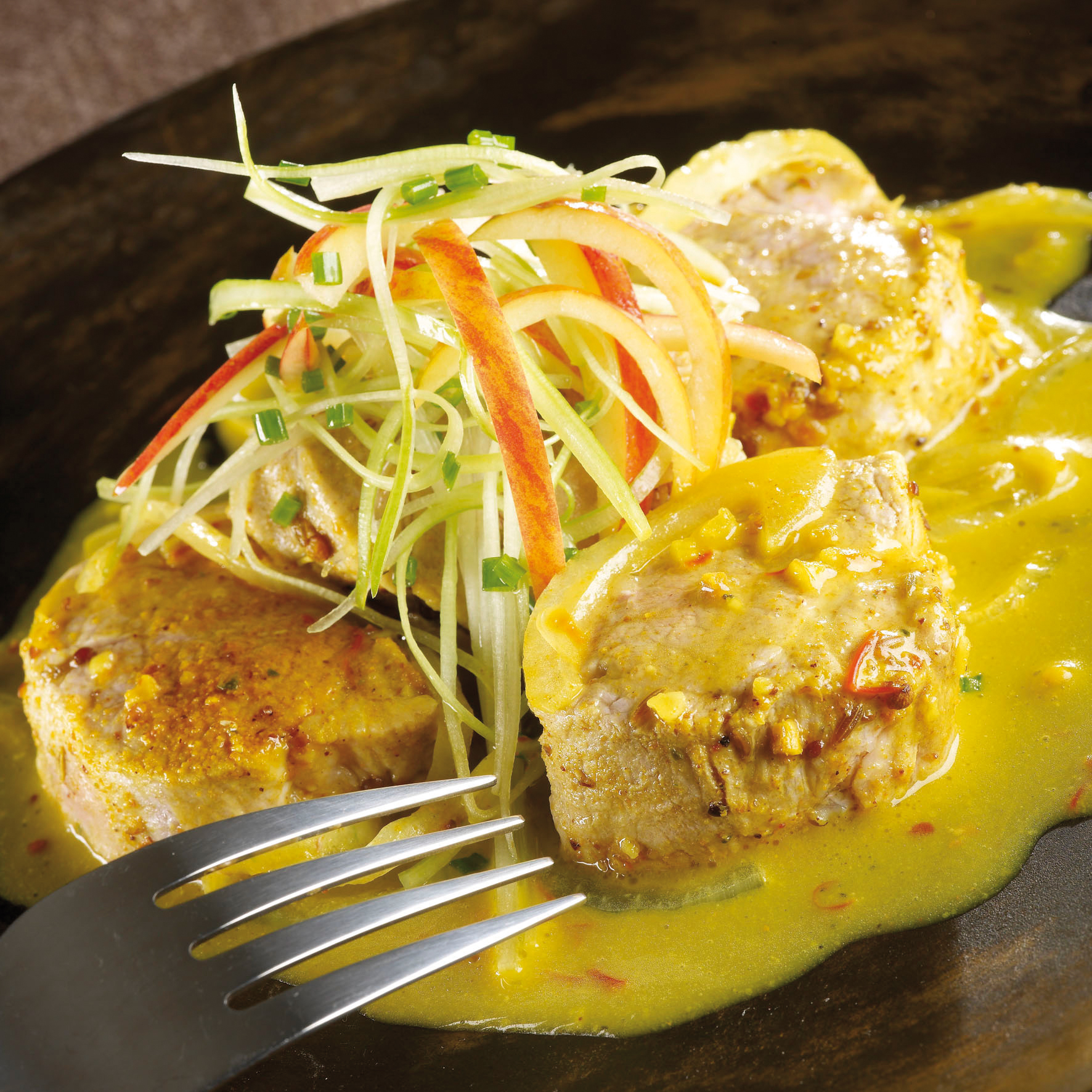 Filete de solomillo de cerdo con pimentón y bulgur de verduras