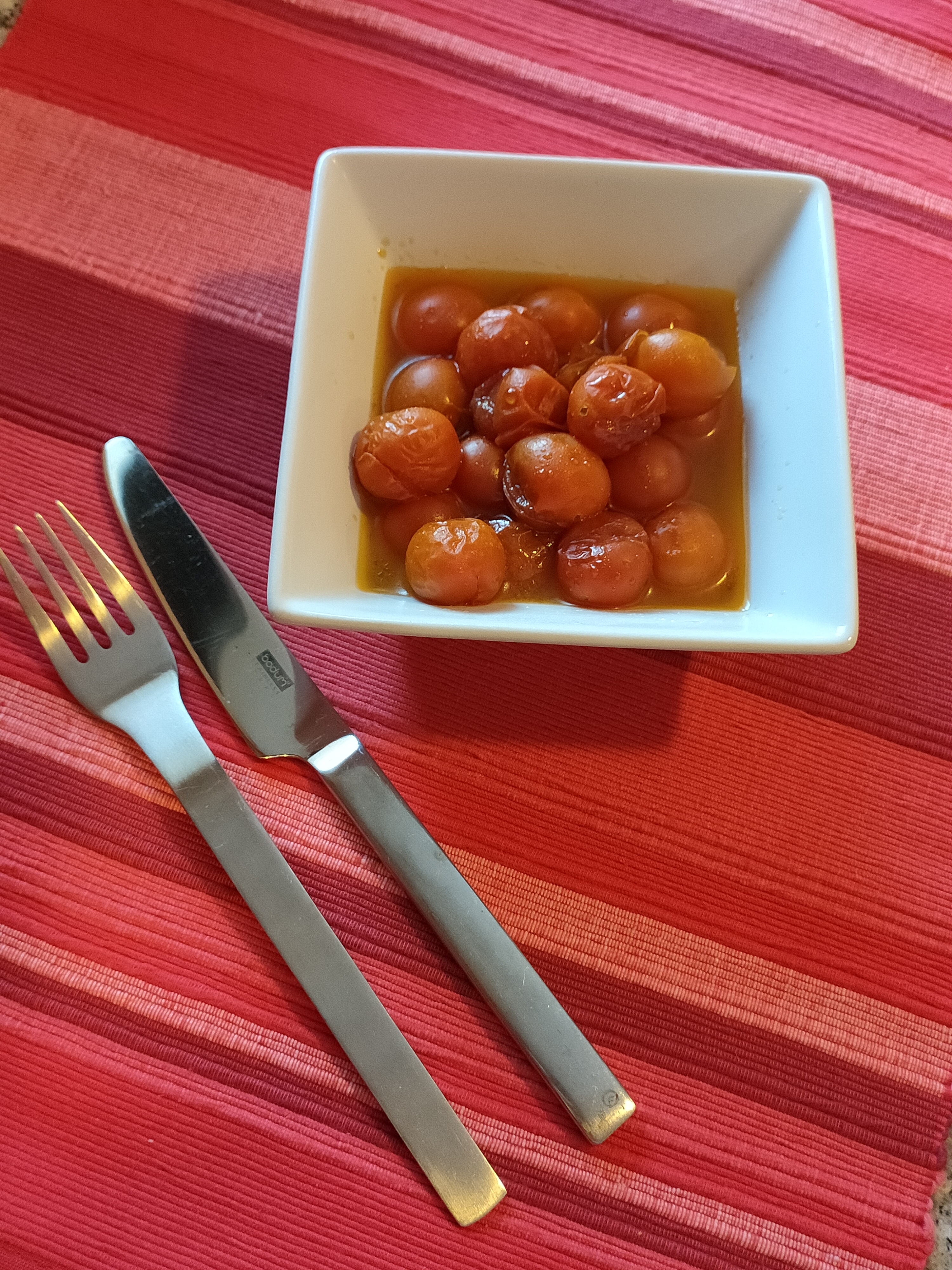 Tomates cherry confitados