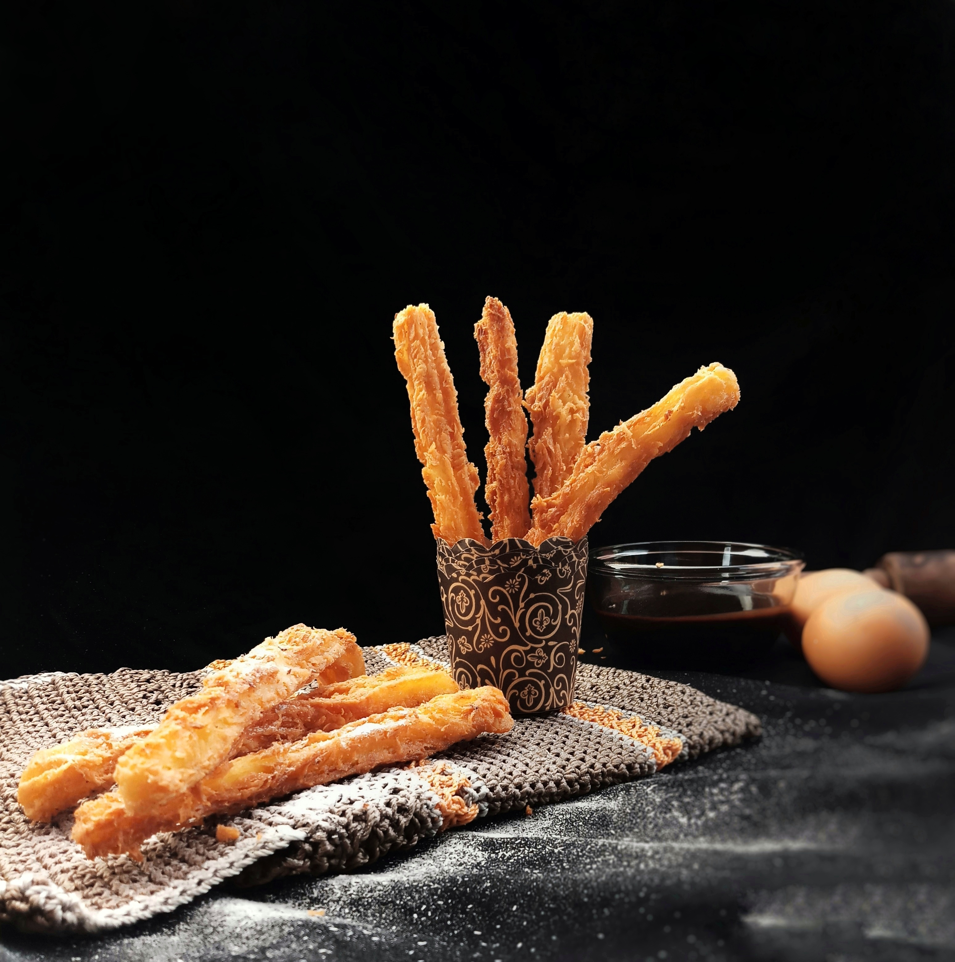 Churros salati con chorizo e parmigiano