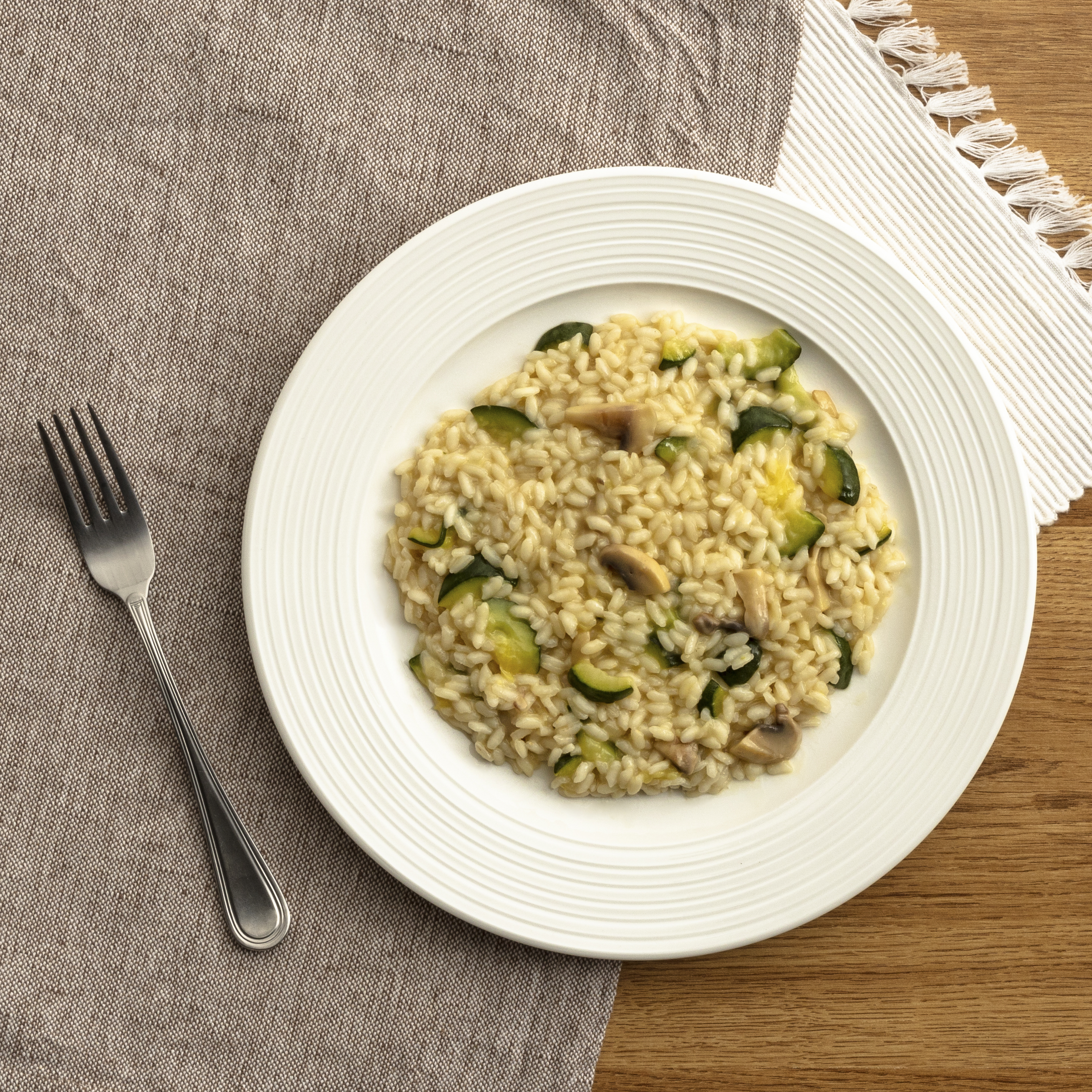 Risotto zucchine e funghi