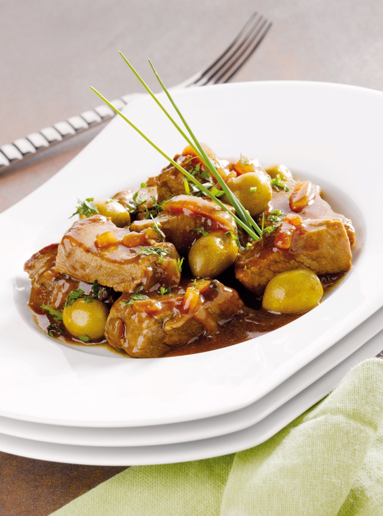 Kalbfleisch mit Rahmsauce und Oliven