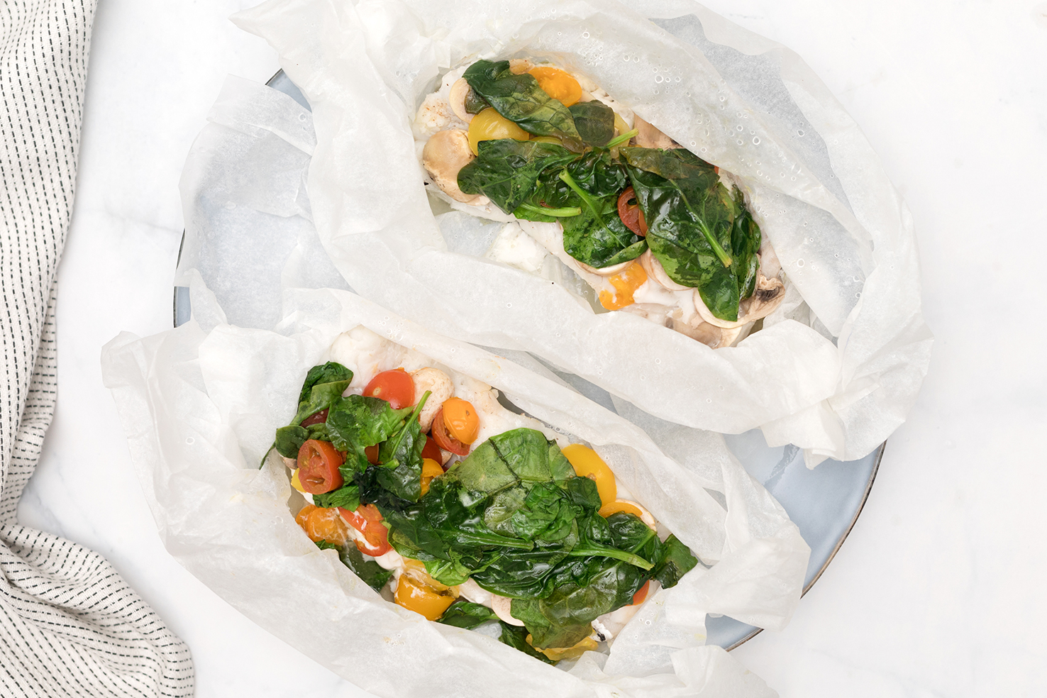 Papillotes de merluza con verduritas