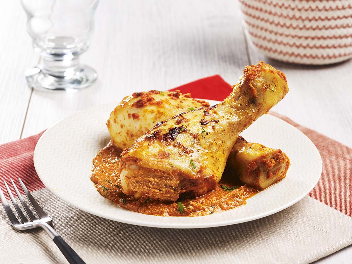 Hähnchenkeulen mit Tomate und Pesto