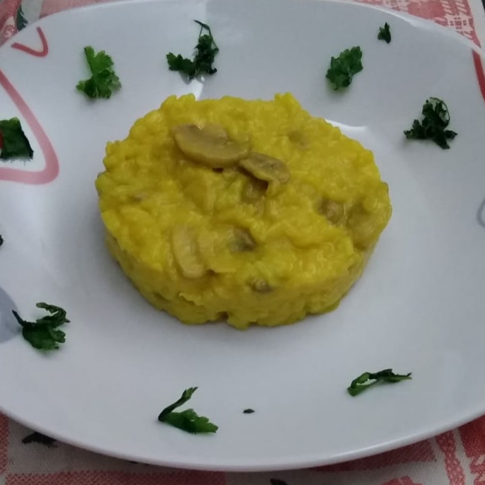 Risotto giallo con funghi